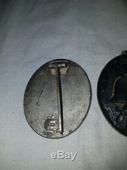 2 X Original early WW2 German Wound Badges One Silver One Black maker mark 107