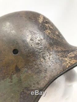 Original German WWI M16 Helmet with Original Camouflage and Skull Painted Relic