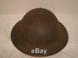 Original U. S. WW1 M1917 helmet, ZC196 with original WW1 USMC badge