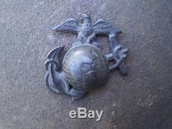Original U. S. WW1 M1917 helmet ZC24 with original WW1 USMC badge