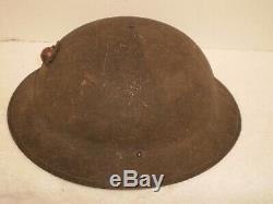 Original U. S. WW1 M1917 helmet, ZC257 with original WW1 USMC badge
