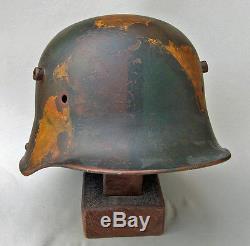 Original WW1 German M16 Helmet painted with camouflage and iron cross