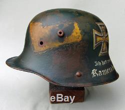 Original WW1 German M16 Helmet painted with camouflage and iron cross