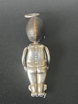 P1. 83 Antique Silver FUMSUP World War One Charm With Articulated Arms