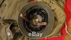 RARE WW1 NAMED U S SOLIDER GROUPING-HELMET, TUNIC, OVERCOAT, GAS MASK, CAP, PAPERS