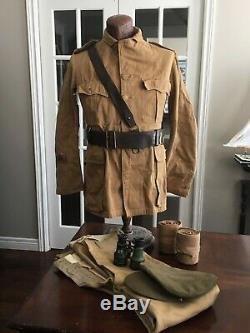 WW1 Uniform group named to Royal Welsh RWF -Tunic, pants, hat, belt, puttees, binocs