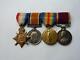 WWI 1914 Mons Star Trio & LSGC Medal to MacKenzie RFA / RA, Group of Four