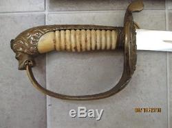 WWI German IMPERIAL NAVAL SWORD & SCABBARD LIONS HEAD GREEN & RED JEWELED EYES